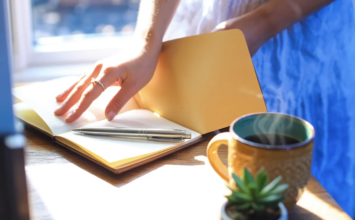 Woman tracking ovulation cycle and planning early pregnancy blood test timing